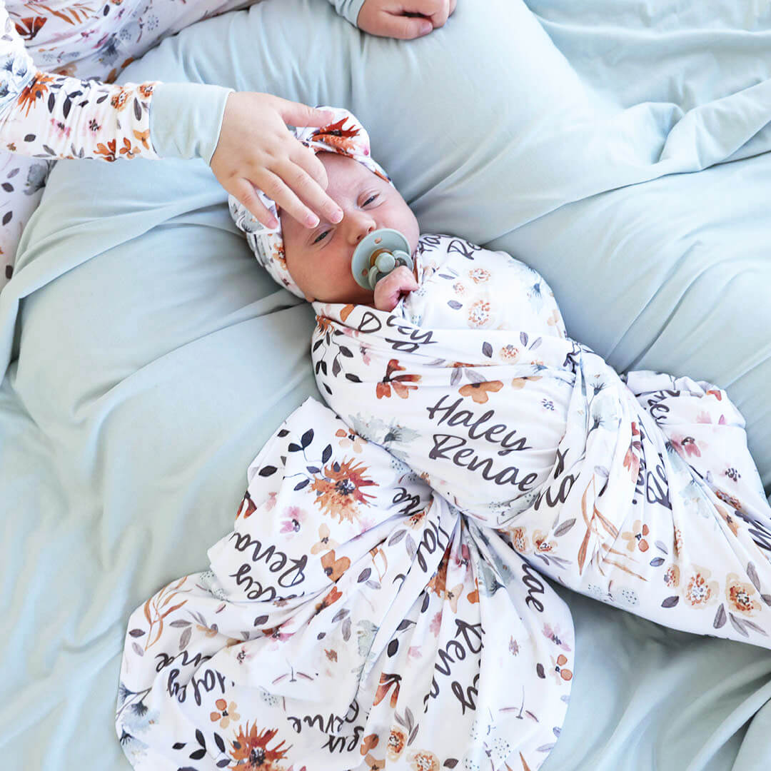 Lorelai's Floral Personalized Baby Name Swaddle Blanket