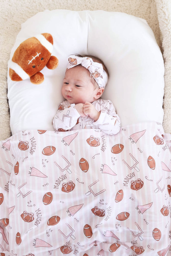 Tiny Touchdowns Personalized Swaddle Blanket | Pink